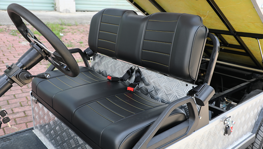 Luxury leather seats on Tara utility task vehicle, with custom two-tone finish, contrast stitching, and enhanced comfort