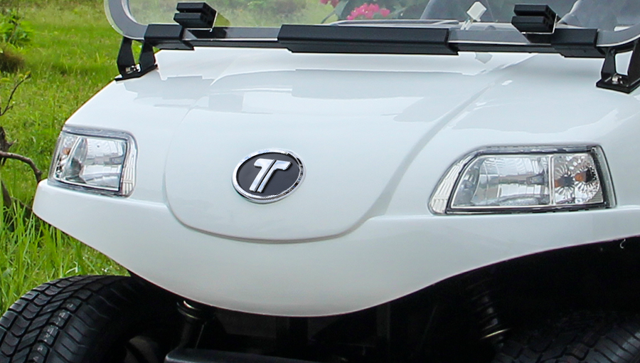 Close-up of Tara utility task vehicle LED headlights providing clear illumination for night driving


