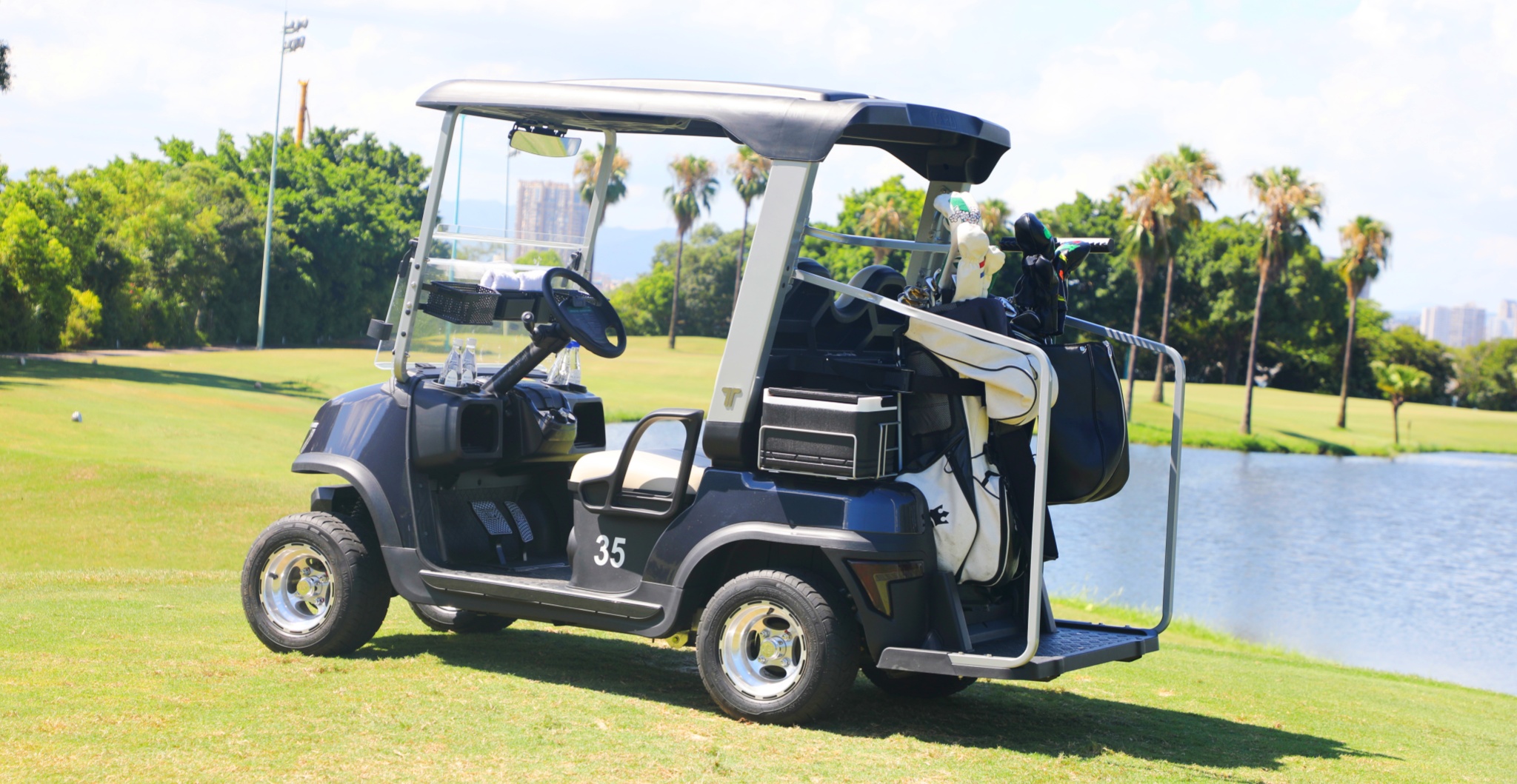 Tara Harmony Utility Task Vehicle Driving on a Lush Golf Course