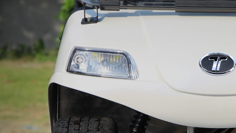 LED headlights on Tara electric utility task vehicle, providing clear visibility for night driving and low-light use