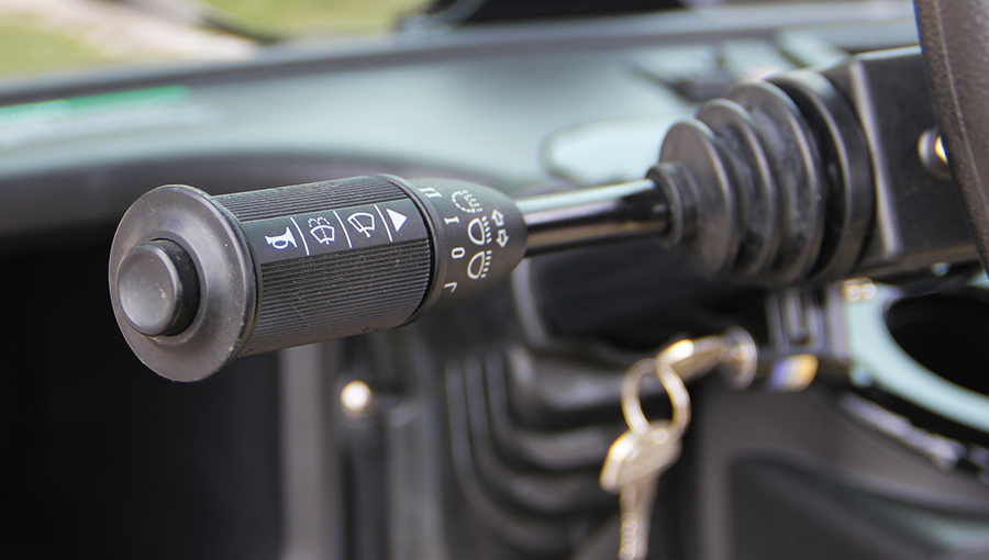 Close-up of approved switches on Tara utility task vehicle dashboard, designed for secure and compliant operation