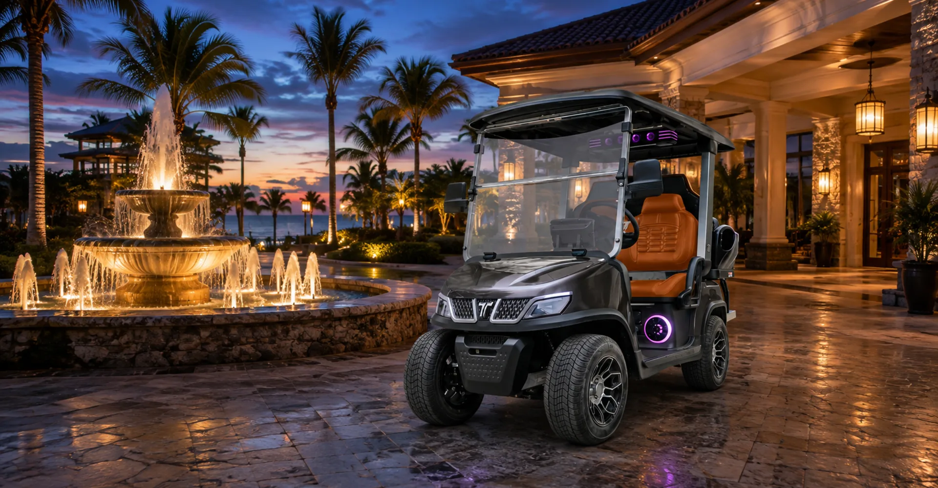 TARA utility task vehicle at a resort entrance in the evening